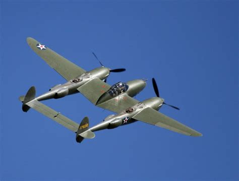 P-38 Glacier Girl flying airshow crowd twin boom WWII fighter