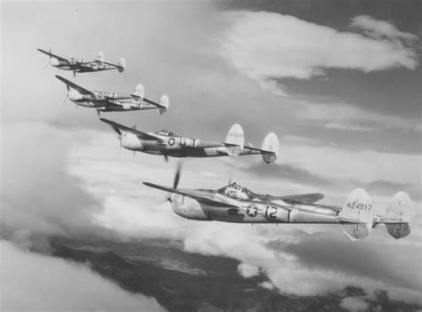 P-38 Lightning escorting B-17 bombers over occupied Europe