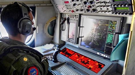 P-3C Orion cockpit and sensor operator consoles during maritime surveillance mission