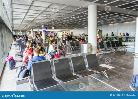packed frankfurt airport departure hall amidst europe airline cancellations june 2025