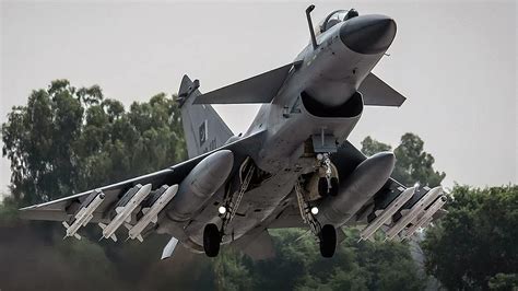 PAF J-10C in formation flight over mountainous terrain