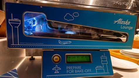 pancake machine inside alaska lounge with hot breakfast setup