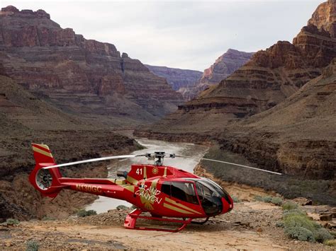 Papillon helicopter descending into Grand Canyon near Colorado River