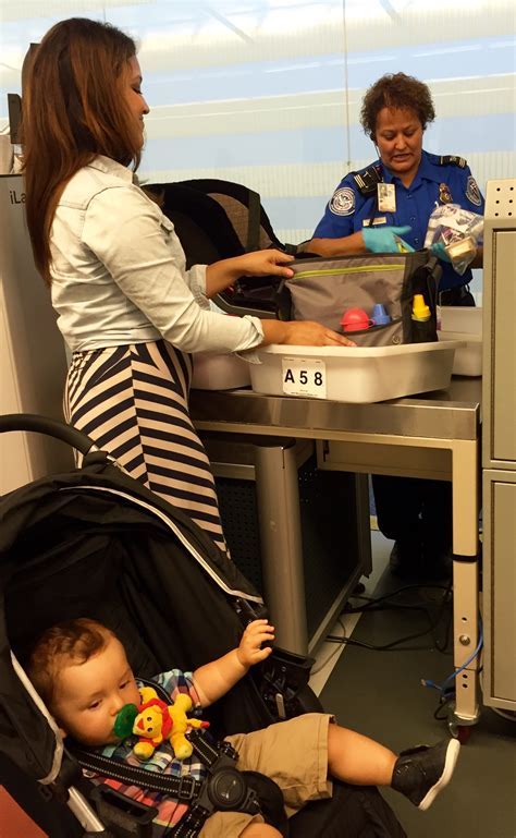 parent passing baby formula through TSA inspection area