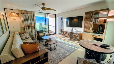 Park Hyatt oceanfront suite with panoramic windows and breakfast setup