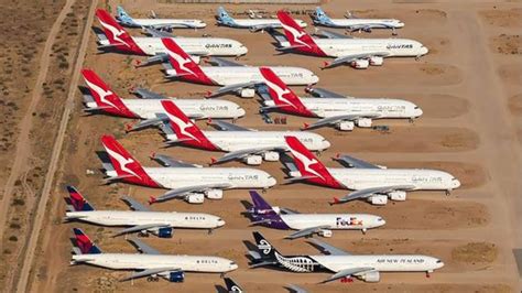 parked Airbus A380 aircraft desert storage retired fleet rows