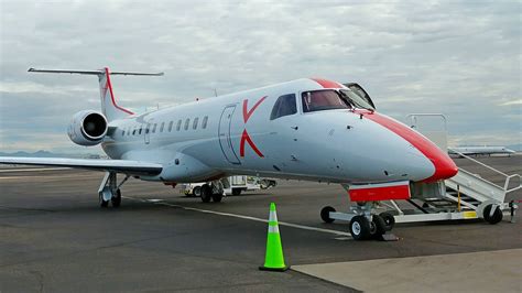 Part 135 charter operator aircraft with public charter branding at regional hub