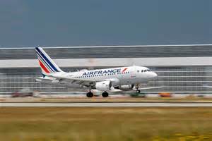 Passenger boarding Air France Airbus A318 at Paris CDG