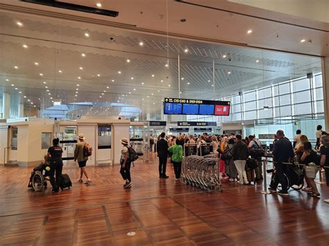 passenger terminal interior at Copenhagen Airport during peak hours