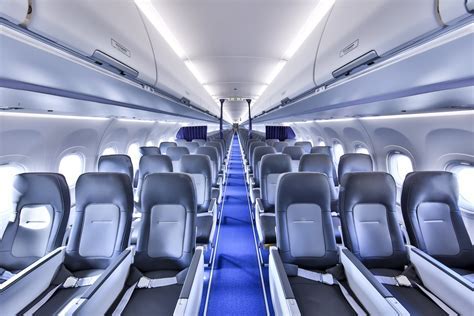 passengers boarding Boeing Airbus narrow body aircraft cabin