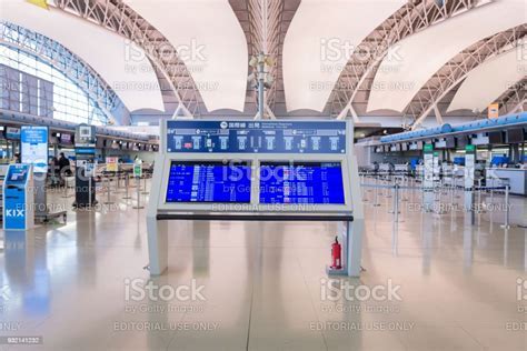 passengers boarding planes at kansai airport terminal