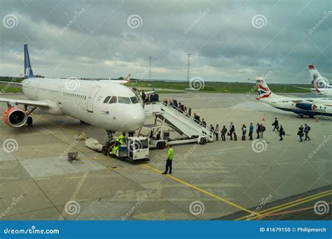 passengers boarding SAS flight during summer season at Copenhagen Airport