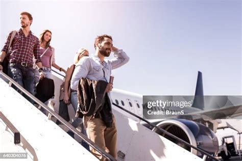Passengers disembarking a Delta flight at Dayton International Airport