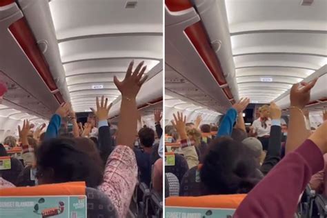 Passengers raising glasses during final return leg from Antarctica air tour