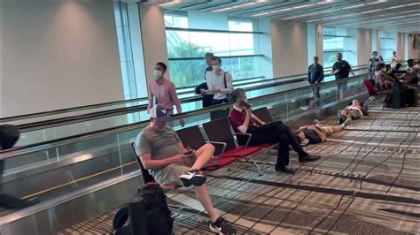 passengers relaxing inside Singapore Changi Airport transit area