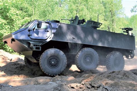 Patria 6×6 traversing rugged terrain during trials