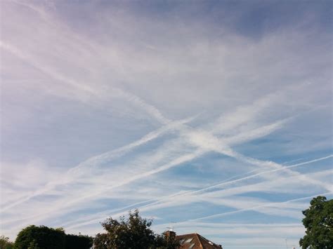 persistent spreading contrail expanding into cirrus cloud layer