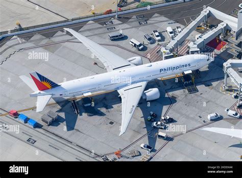 Philippine Airlines Boeing 777-300ER on SFO runway at night