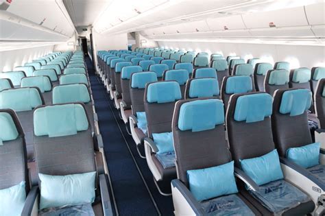 philippine airlines economy cabin showing window and aisle seats