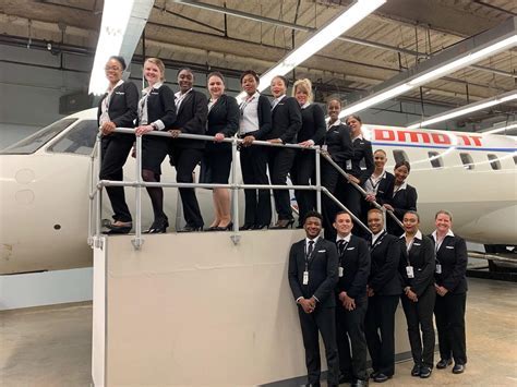 piedmont airlines employee group photo on airport ramp