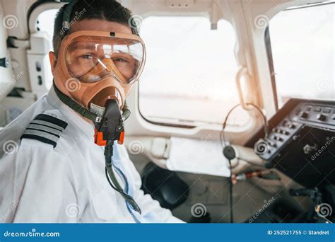 pilot using supplemental oxygen mask during flight