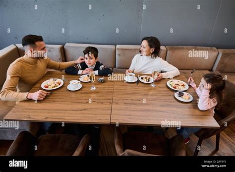 pilots enjoying lunch together at an airport restaurant