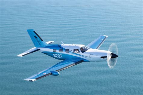 Piper M600 in mid-air against the backdrop of clear skies