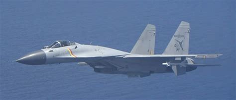 PLA J-15 fighter during close intercept of Japanese P-3C Orion in June 2025