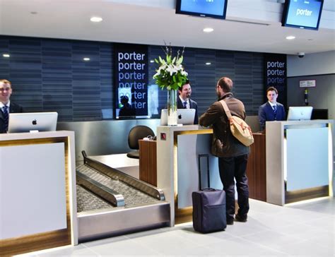 porter airlines check-in counter with smiling passengers at billy bishop airport