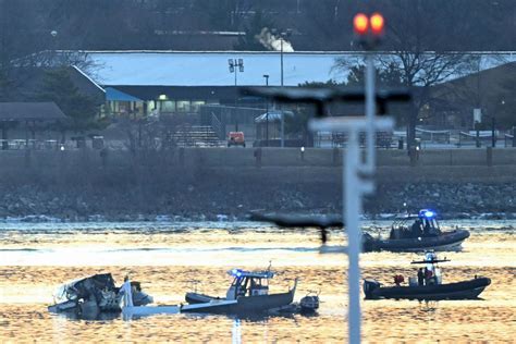 Potomac River collision site at night with debris