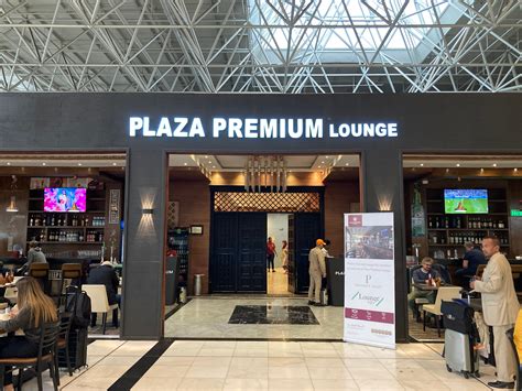 premium airport lounge dining experience with chef-prepared meals and runway views