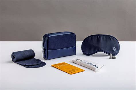 premium economy amenity kit pillow blanket hot towel long haul flight
