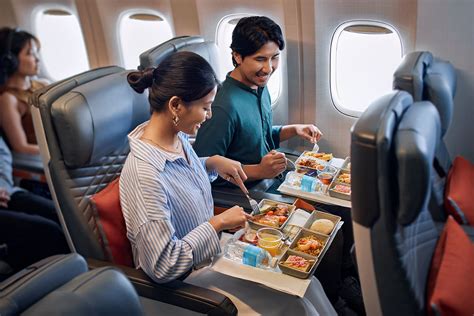 premium economy meal service ceramic dishes airline dining
