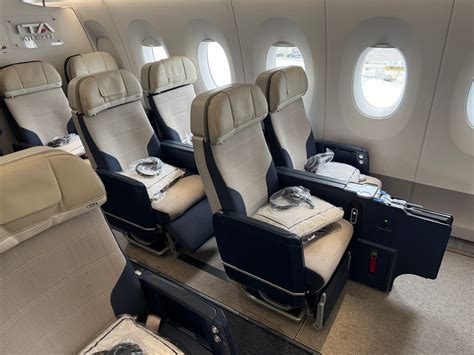 premium economy priority boarding international airport travelers