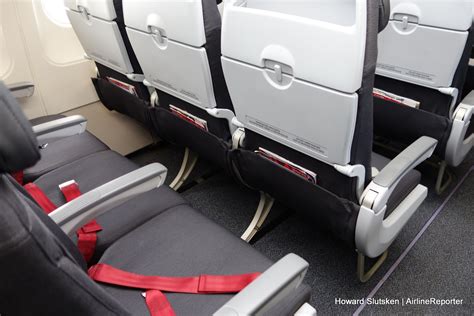 Premium Rouge seating inside Air Canada Rouge A319 bound for Belize City from Montreal