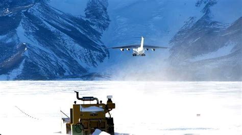 private charter aircraft unloading at Union Glacier with blue ice runway