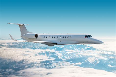 private jet flying above clouds representing environmental impact discussion