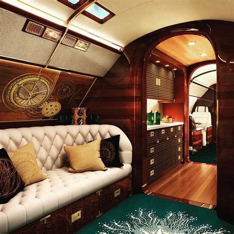 private jet interior with gold finishes and luxurious furnishings