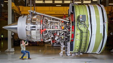 production-conforming ge9x being mounted on boeing 777-9 wing