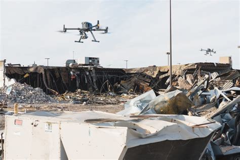 Public safety workers using DJI drones at a disaster response drill in California, illustrating civilian benefits of the technology