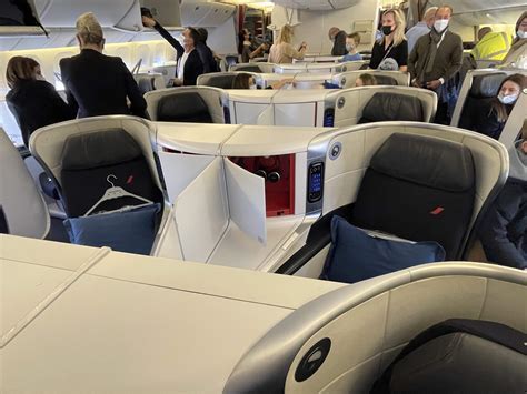 qantas air france business class travelers connecting in singapore airport terminal