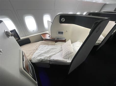 Qantas Airbus A380 first class suite with luxury inflight dining setup
