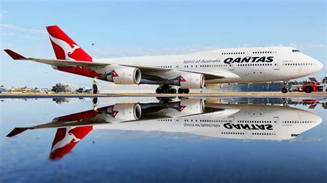 Qantas Boeing 747-400 flying above Sydney Harbour during early 2000s operations