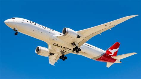 qantas boeing 787-9 taking off from melbourne airport bound for dfw
