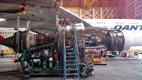 Qantas engineers working overnight at Changi Airport on Airbus A380 repairs