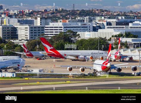 Qantas ground crew servicing A380 at Sydney Kingsford Smith Airport before Singapore departure