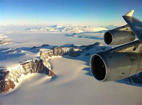 Qantas sightseeing flight over Antarctica with ice shelves visible from passenger window