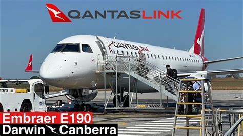 QantasLink Embraer E190 parked at Perth Airport ready for regional operations
