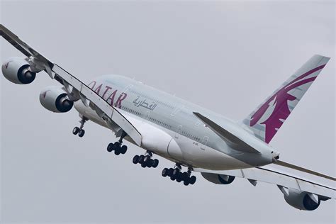 Qatar Airways A380 at Doha Hamad International under evening light