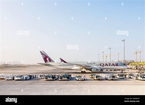 qatar airways airbus a350 parked at hamad international airport